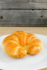 croissants on a wooden background