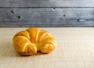 croissants on a wooden background
