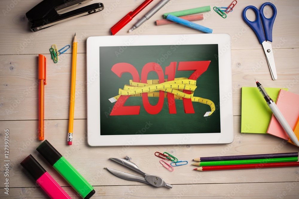 Poster composite image of digitally generated image of new year with ta