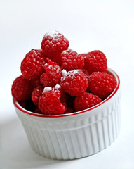 Red Raspberries in Bowl Isolated