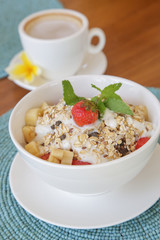 Healthy breakfast - cereal bowl with fruits