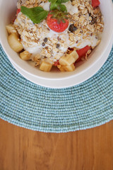 Healthy breakfast - cereal bowl with fruits