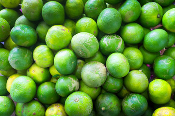 Green Lemon Background, Group of fresh Lemon Top View