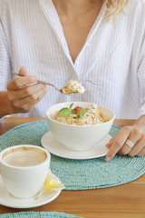 Obraz na płótnie Canvas Healthy breakfast - cereal bowl with fruits