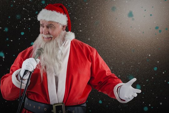 Composite image of santa claus singing song