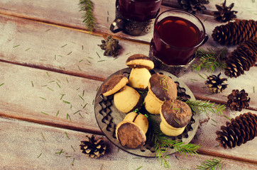 Cookies mushrooms with chocolate icing