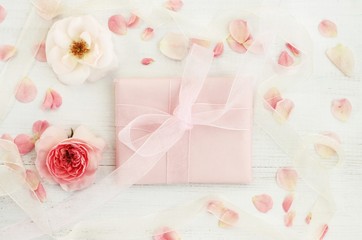 
Floral decorated handmade pink paper feminine	 gift, delicate lovely rose flowers and petals,...