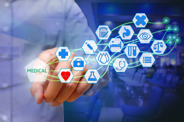Asian young man pressing medical icon on virtual screen. Healthc