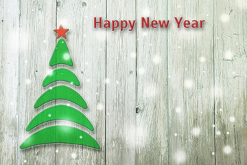 New Year and Christmas conceptual tree on an wooden background.