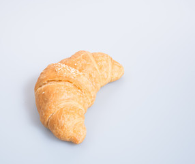 croissant or tasty croissant on the background.