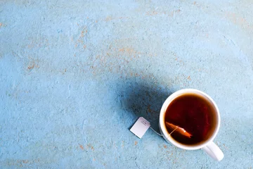 Papier Peint photo autocollant Theé tasse de thé avec un sachet de. Vue de dessus, espace de copie
