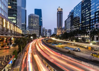 Fotobehang Jakarta rush hour in business district in Indonesia capital city at night © jakartatravel