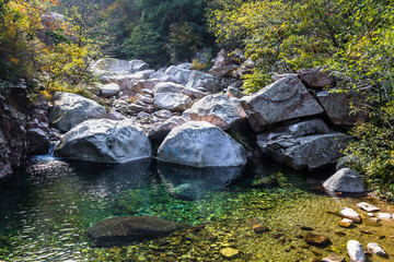 Naklejka na ściany i meble Bei Jiu Shui trail in Autumn, Laoshan Mountain, Qingdao, China. Bei Jiu Shui is famous for the many pools of crystal clear water and it's waterfalls 