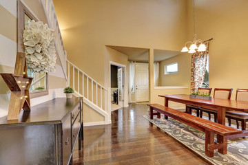 Dining area with rustic wooden table and bench