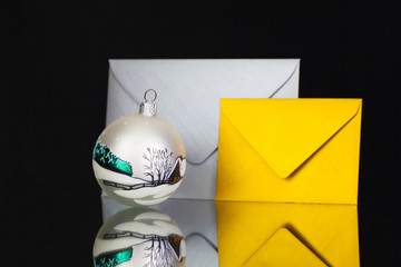Gold and silver  envelopes and Christmas decoration