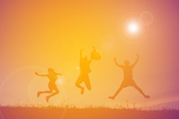 Silhouette of people playing guitar at the sky sunset, happy tim