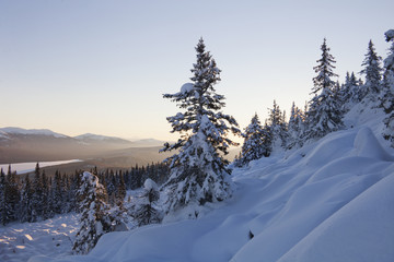 Fototapeta na wymiar View mountain range Zyuratkul, winter sunset landscape