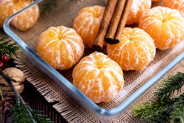 Obraz na płótnie Canvas Peeled mandarins Christmas fruit