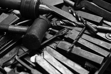 Tool of Obsolete lathe. Black-and-white photo.