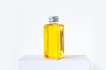 Cosmetic bottle with cap. Natural Moroccan Argan oil for skin and hair, moisturizing and nutritious care