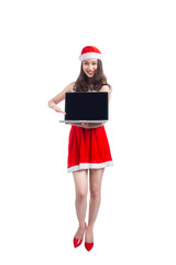 Asian Christmas girl with Santa Claus clothes holding laptop iso