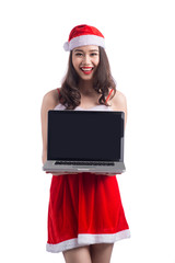 Asian Christmas girl with Santa Claus clothes holding laptop iso