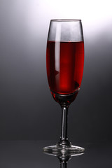 luxury red wine in champagne flute