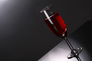 Naklejka na ściany i meble luxury red wine in champagne flute