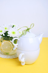 Yellow summer table setting for lemon bundt cake