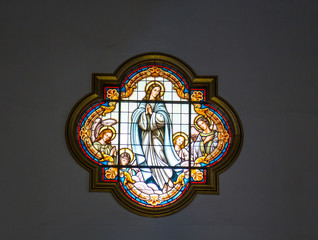 Fototapeta na wymiar Stained Glass Window Interior of the Basilica of Nuestra Senora de la Candelaria located at Candelaria, Tenerife Island.