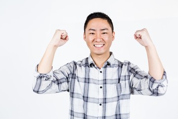 Fototapeta premium Happy man showing wining gesture 