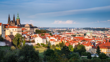 Naklejka na ściany i meble Old Prague panorama with cityscape of Hradcany, St. Vitus Cathedral and red roofs, Prague, Czech Republic