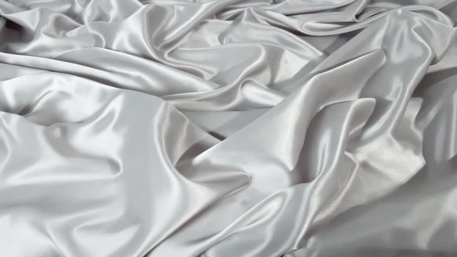 Motion grey backgrounds. Soft crease grey fabric material