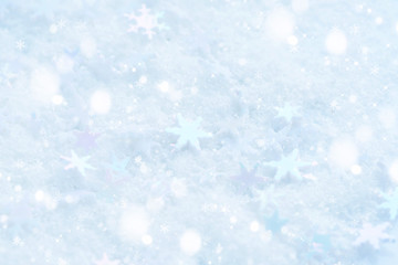 Christmas snowflakes of decoration on snow. Christmas festive background