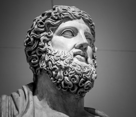 Head and shoulders detail of the ancient sculpture