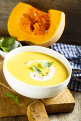 Pumpkin soup with basil and cream