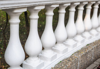 white balusters made of cement, architectural element