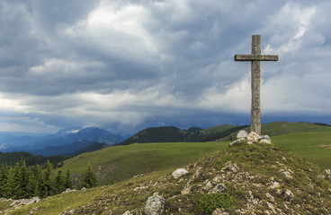 Wooden cross on the mountain