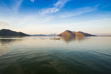 fisherman on a big lake