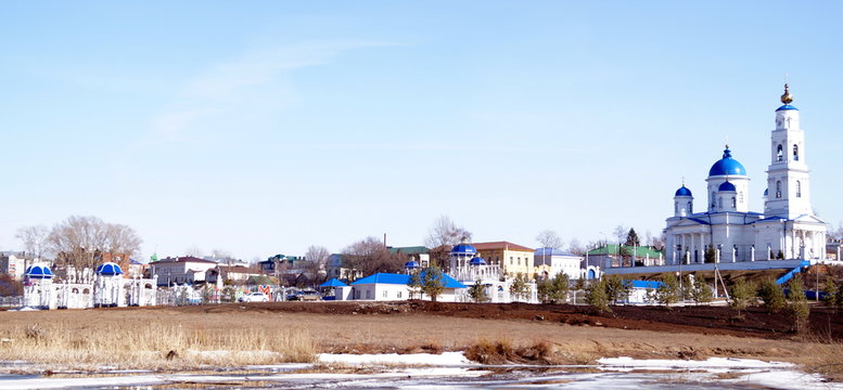 Panoramic views of the park and the white cathedral with blue domes. City Chistopol, Tatarstan, Russia.