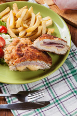 Cutlet Cordon Bleu with pork loin served with French fries and s