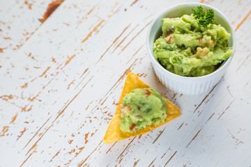 Guacamole sauce and nachos