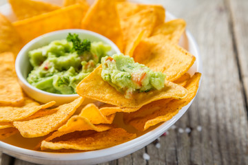 Guacamole sauce and nachos