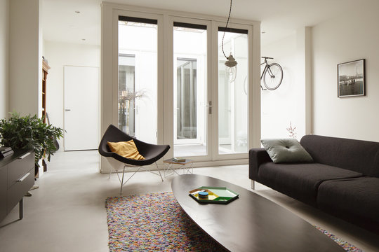 a modern living room with design furniture