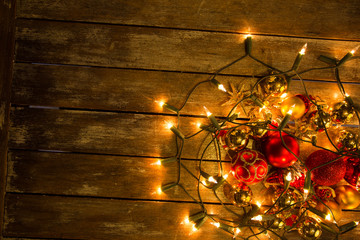 Christmas / New Year fairy lights on a wooden table to be used a