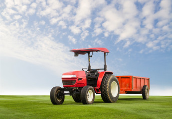 Red tractor with trailer