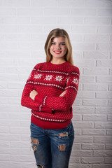 Beautiful girl in red Christmas jacket. 