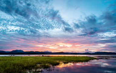 Fototapeta na wymiar landscape mountains and water view in sunset sky, in kanchanabu