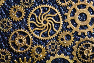 steampunk mechanical cogs gears wheels on leather background