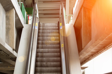 escalator in sky train station with Soft focus effect
